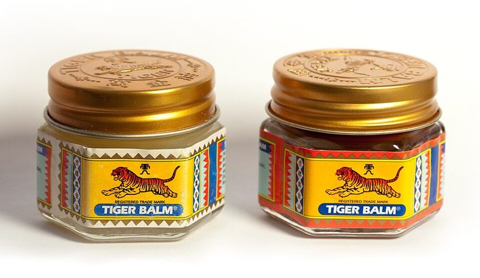 Small tin of medicated muscle balm